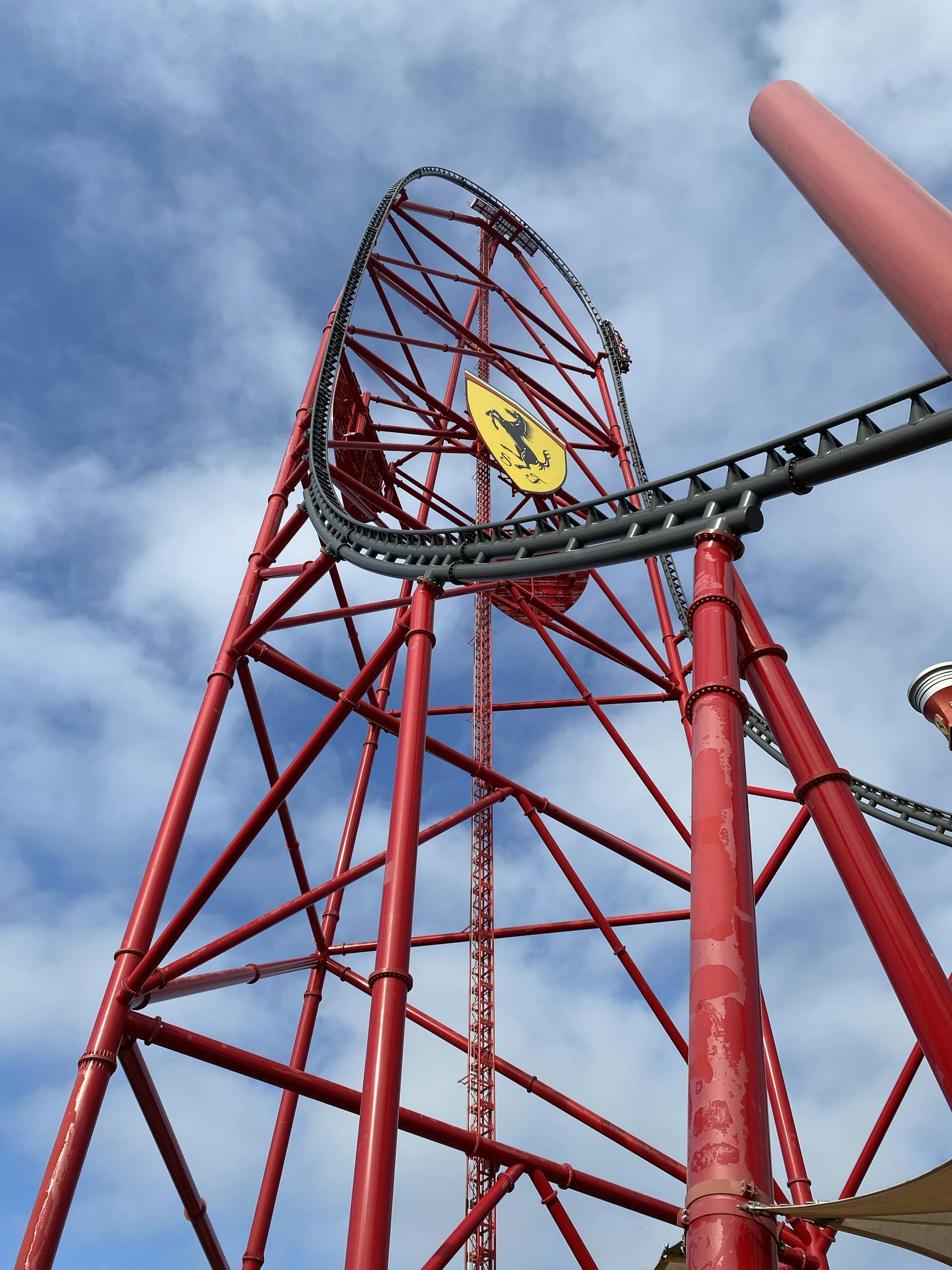 A thrilling low angle shot of the Red Force roller coaster at PortAventura's Ferrari Land in Spain.